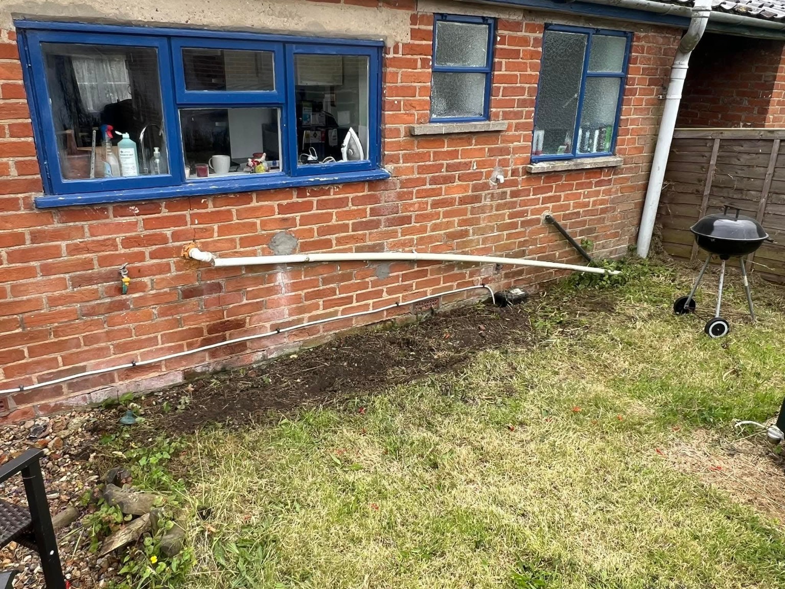Cleared border along the house wall